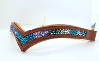 Mermaids for days with this browband!We take the time for quality! Our browbands are barn tested and made to last. We include a few extra crystals in the rare case of an accident. Please note that The Bling Bay browbands usually ship same or next day, but can take up to 2 weeks to be processed if the materials are not on hand to be made. We will contact you same or next day informing you if there is any wait duration before shipment.The best way to measure for a browband is to measure your curre
