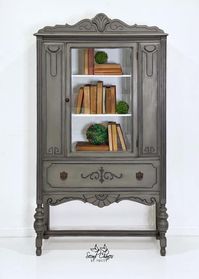 Combine neutral colors to create a gorgeous finish! Black and Grecian Clay exterior, Bone Interior. Painted by Second Chances by Misty. #wiseowlpaint #neutral #brown #painted #furniture #cabinet