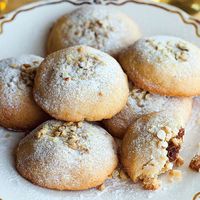 These butter cookies are unmistakably Middle Eastern; Persian Jews make them at Purim, while Arabic Christians eat a similar cookie at Easter, as do Muslims during various Eid celebrations. The key to getting the cookies to keep their shape is to refrigerate them until firm after filling and shaping. The combination of gluten-free flours here produces a nutty taste and a light texture, but you can use an equivalent amount of white flour.