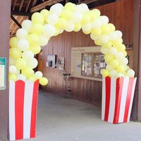 Circus Popcorn Balloon Arch by Inflation Sensations: Circarnival Wedding Details | Vintage Circus Carnival Wedding on a Budget | Lola Tangled blog