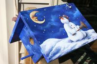 sherrylpaintz a winter painting with a snowman and moon on wood birdhouse