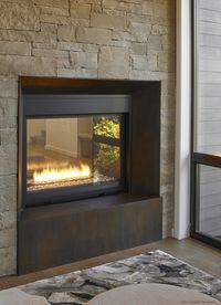 Cozy up to this fireplace for the holidays Production Overview: The site is surveyed, a 3D model is made, steel is water-jet cut, sandblasted, sanded and painted with a custom patina solution - Fine Homebuilding