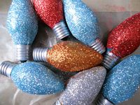 Burnt out Christmas lights dipped in glitter then piled in a big clear jar.