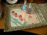 Put vintage hankies in an old frame for a cute tray