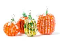 Bring your favorite fall motif into your beadwork with this pattern for Precious Pumpkin Beads. Halloween craft ideas for beaders can be hard to come by, which makes these little seed bead squashes extra special.