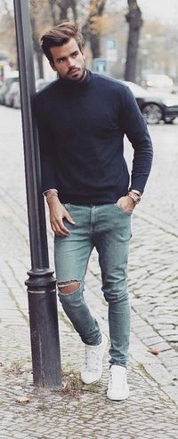 Fall combo inspiration with a navy sweater watch wrist accessories ripped light blue jeans white sneakers no show socks. model unknown. #fallfashion #falloutfits #menswear #menstyle #mensapparel #whiteshoes #whitesneakers #mensfashion #sweater #mensoutfits #rippedjeans