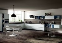 Curved base units and linear base units create an effective balance of components, volumes and proportions.