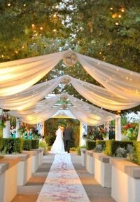 How pretty is this outdoor wedding lighting idea??