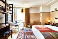 This stylish hotel with a social justice mission attracts hip young travellers with its artisan design features, new-age wellness programme, and quality drink and dining offerings. Retro furnishings, an impressive library, radio station, political art gallery and cinema add to the unique appeal of this bold concept.