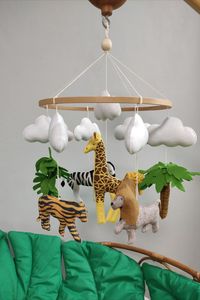 This Baby Mobile Safari Neutral with realistic African safari animals. Mobile includes giraffe, zebra, Tigr, Lion, Palm Tree, cloud and leafs. Best present for your new child or for a baby shower. The parts could be changed and a completely new one can be added. Let's create a unique mobile for your baby.