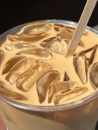 this is a photo of an iced vanilla latte with oat milk