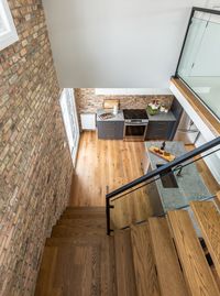 This beautiful historical triplex underwent a complete re-build from top to bottom. Each apartment was designed with function and style in mind. From Chicago reclaimed brick accent walls to a custom floating metal staircase, every design detail was considered. Patterned tile and custom kitchens gives each apartment its own personality.
