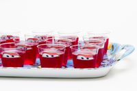 lightning mcqueen mini jelly cups, eyes printed on photo paqper, cut out and hot glue gunned to the front, tyres drawn on with permanent texta.