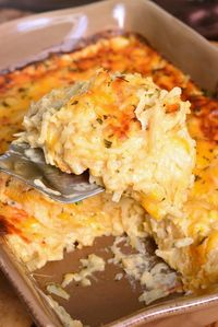 Hashbrown Casserole. Wonderful comforting potato dish loaded with cheddar cheese and creamy sauce. It's easily prepared without canned soup and baked to a gooey perfection. #sidedish #potatoes #sides #casserole #hashbrowns