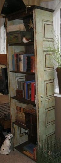 Bookshelf made from vintage old doors; cut one door in half to make sides; repurpose, salvage, upcycle, recycle, diy; cottage style home decor or retail store display. For ideas and goods shop at Estate ReSale & ReDesign, Bonita Springs, FL by Joao.Almeida.d.Eca