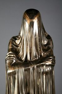 Sculpture by kevin francis gray. (Reminds me of the creature from the M.R. James story "Count Mangus": "The figure was unduly short, and was for the most part muffled in a hooded garment which swept the ground."