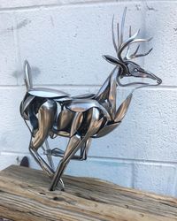 Artist Shapes Old Cutlery Into Magnificent Metal Sculptures Of Animals