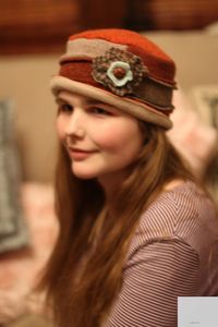 Warm and stylish hat in rust, tan and aqua made from recycled wool sweaters.. $30.00, via Etsy.