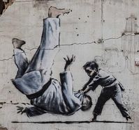 BanksyMarketPlace on Instagram: "Take that ! @banksy #banksy #banksyart #banksyartwork #banksystreetart #streetart #urbanart #bluechipart #girlwithballoon #gwb #canvas #metal #wood #walledoffhotel #dismaland #banksydoesnewyork #canvas #print #bristol #modernmaster #pestcontrol #art"