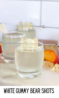 white gummy bear shot is made with a few simple ingredients and is super delicious. Enjoy them as a shot, or over ice as a refreshing cocktail. Mix up your next party drink in just a matter of minutes! #shots #partydrinks #cocktails #whitegummybear #girlsnightout #drinking