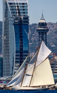Beautiful image of one of our classics sailing in front the W Barcelona Hotel during the last Edition of the Puig Vela Clàssica Barcelona Regatta.