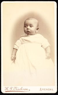 Trygve Nikolai Elmenhorst was born in Norway in 1891. This photo must have been taken not long after since he is still just a little baby. He grew up to be a machinist. The photo is available in high quality on our website and it is free to use with us listed as a source.