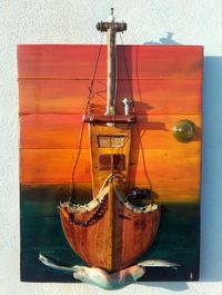 boat on pallet wood,sunset..