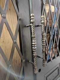 Here's a sneak peek at wrought iron door that was recently delivered. We especially love all the detail work on the handles. Next step is for the glass to be installed. front door. entry door. doors. home remodel. dream home. design details. home design. curb appeal. custom home.