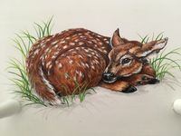 sherrylpaintz a baby fawn deer on wood peg rack