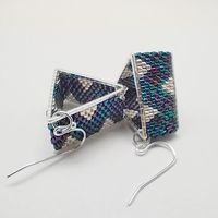 This series of geometric earrings was created out of love for beads, colour and spatial, though openwork shapes.