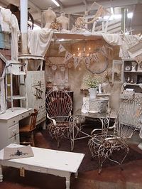 lovely booth use space above trellis and big cubbies. trellis panel roof attached create a pitch to roofmmmmmm???