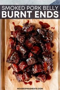 Smoked Pork Belly Burnt Ends are irresistible, juicy bites of mouthwatering meat (the same kind used to make bacon) that is rubbed in spices, infused with smoky flavor, and tossed in a fabulous barbecue sauce. Eat them as an appetizer by spearing with toothpicks, or throw them into tacos or salads, onto buns for pork belly sandwiches, or over nachos. | smoked pork belly burnt ends side | smoked pork belly burnt ends rub | smoked pork belly burnt ends recipe