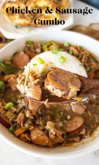 Chicken and Sausage Gumbo is a hearty bowl of comfort with juicy pieces of chicken, andouille sausage, and veggies swimming in homemade roux. #gumbo #chicken #cajun #cajunrecipe #creole #chickenrecipe