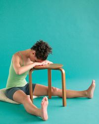 "Melt Stress with One Yoga Pose A Day." Well, I can't do all of these poses either, but I can modify the one that impossible for my knee. So doing one of these during my pathetically short lunch.