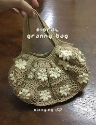 Floral Granny Bag Crochet Granny Square Handbag by Kittying Crochet Pattern from www.kittying.com | crochet bag, Crochet Granny Square, Crochet Pattern, crochet pouch, Floral Granny Bag, For Grandmother, For Great Grandmother, For Mother, For Mum, Gift for mum, Granny Square, Granny Square Handbag, Handbag, Mother’s Day, Crochet Pattern Floral Granny Bag Crochet Granny Square Handbag by Kittying Crochet Patterns for mother, grandmother and great grandmother by Kittying Crochet Pattern
