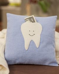 so easy and adorable. no more tooth fairy digging around for the tooth. by heidi
