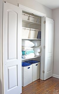 Turn your bi-fold door into French doors with this easy tutorial! It shows you exactly how to create your own custom closet with beautiful DIY French doors. This budget-friendly closet makeover will have a huge impact on your home! | decorbytheseashore.com