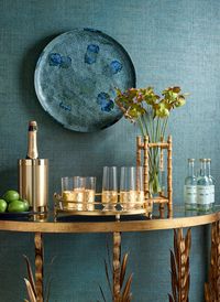 Modern wallpaper to accessorize your bar cart. Design your homes high-traffic areas with Texture Resource 8, a new vinyl performance wallpaper collection by Thibaut. #barcart #modernwallpaper #interiordesign
