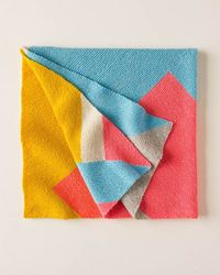 Easy Puzzle Blanket to knit at #purlsoho #freeblanketpattern Would be cute for a baby too. Learn how to "pick up stitches" for this #freepattern #colorblock