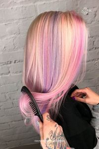 "As though colorful beams of light were caressing your hair, this pastel rainbow trend will add plenty of glam to your summer look."