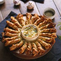 Baked Camembert With Pancetta Breadstick Twists. The perfect way to spice up your dinner party.