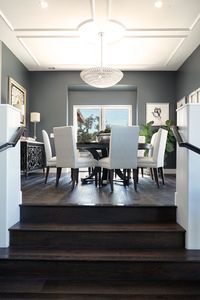 Gorgeous Dining Room with Chandelier and stunning ceiling architectural detail #diningroom #diningroomideas #chandelier #ceiling #ceilingdetail #ceilingideas #architecturaldetail #diningroomchairs #diningroomchandelier
