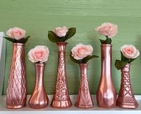 These vases are super common in all thrift stores and usually super cheap too! Not sure what to do with them but definitely and idea