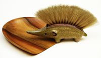 http://www.ebay.at/itm/WALTER-BOSSE-IGEL-TISCHBESEN-TEAK-KARLSRUHER-MAJOLIKA-MID-CENTURY-CRUMB-BRUSH-/301543466311?pt=LH_DefaultDomain_77