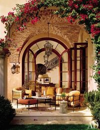 Love the bougainvillaea and the patterns with brick. of this loggia.
