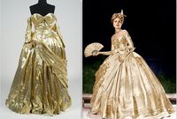 Grace Kelly in a gold dress in the film '' To Catch a Thief '', 1954
