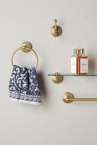 Think shiny bling for smaller accessories and fixtures to add that sparkle in your bathroom. An oxidised finish to the metal embellishments adds some visual drama. Image courtesy, Anthropologie
