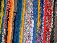 Use these step-by-step instructions on how to make a braided rug using old clothing to create a colorful throw.