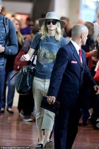 Bonjour! Jennifer Lawrence, 27, kept it casual as she touched down at France's Charles de ...