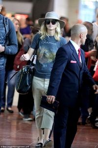 Bonjour! Jennifer Lawrence, 27, kept it casual as she touched down at France's Charles de ...